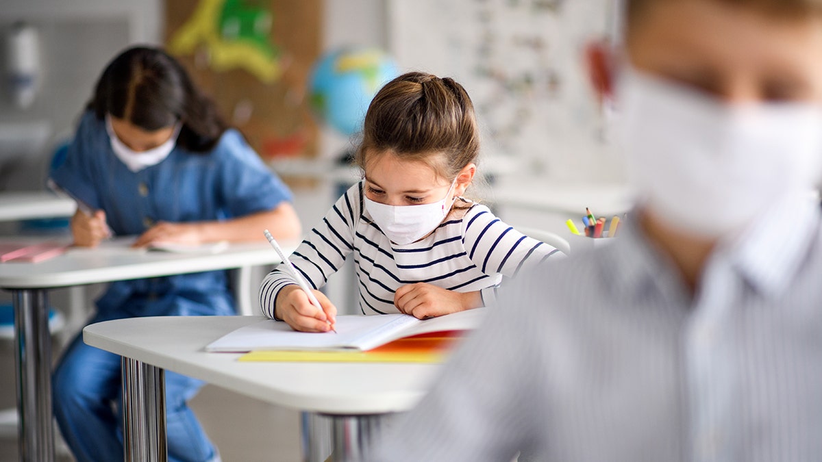 kids wearing masks in school