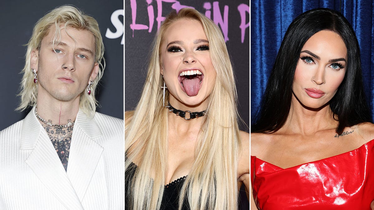 Machine Gun Kelly wears a striped white suit with long blonde locks split Sophie, MGK's guitarist sticks out her tongue and wears a long dagger earring, black spiked choker, and black busty top split Megan Fox with dark hair and a latex red strapless dress
