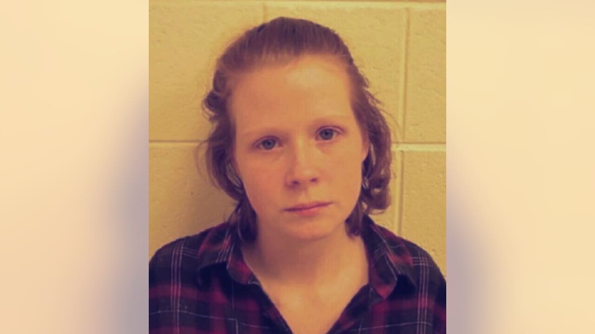 Mugshot of a woman suspected of shooting substations in Baltimore, MD.
