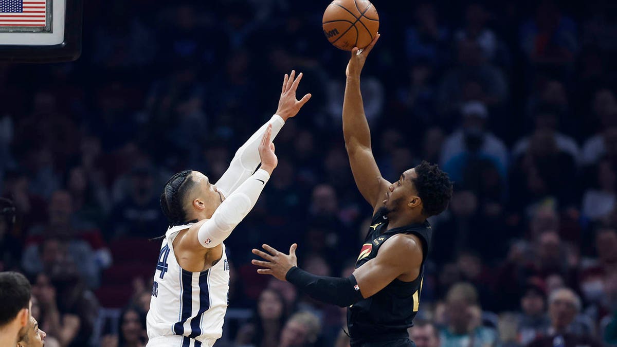 Donovan Mitchell shooting over Dillon Brooks