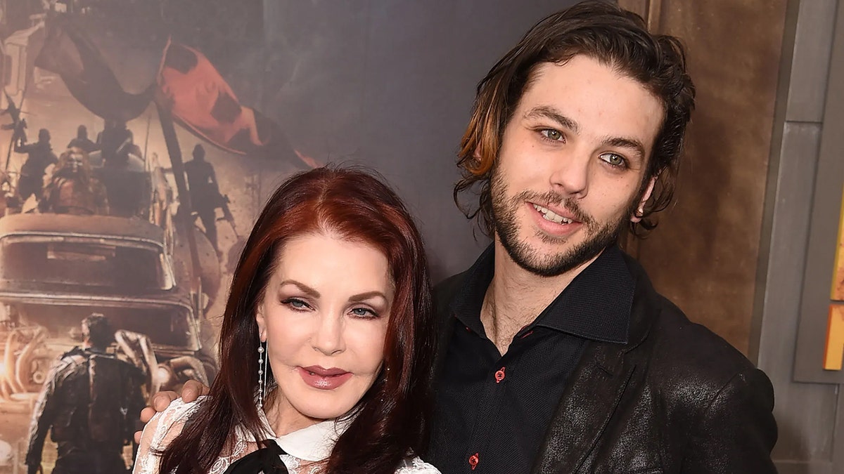 Priscilla Presley and Navarone Garcia airs connected reddish carpet