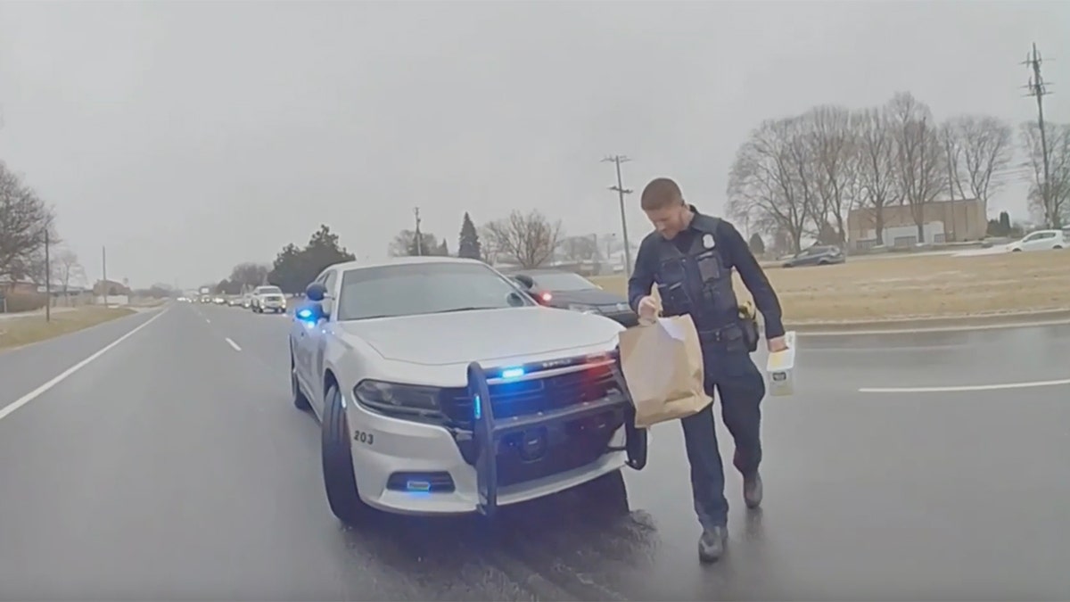 officers with DoorDash delivery