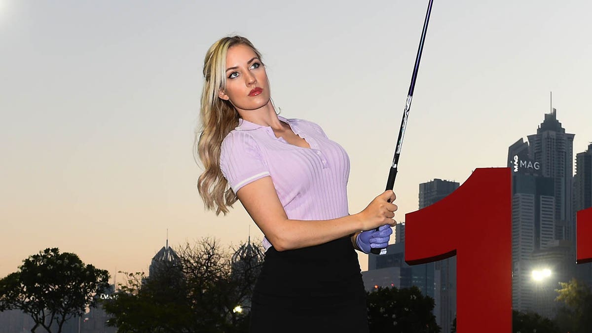 Paige Spiranac swinging