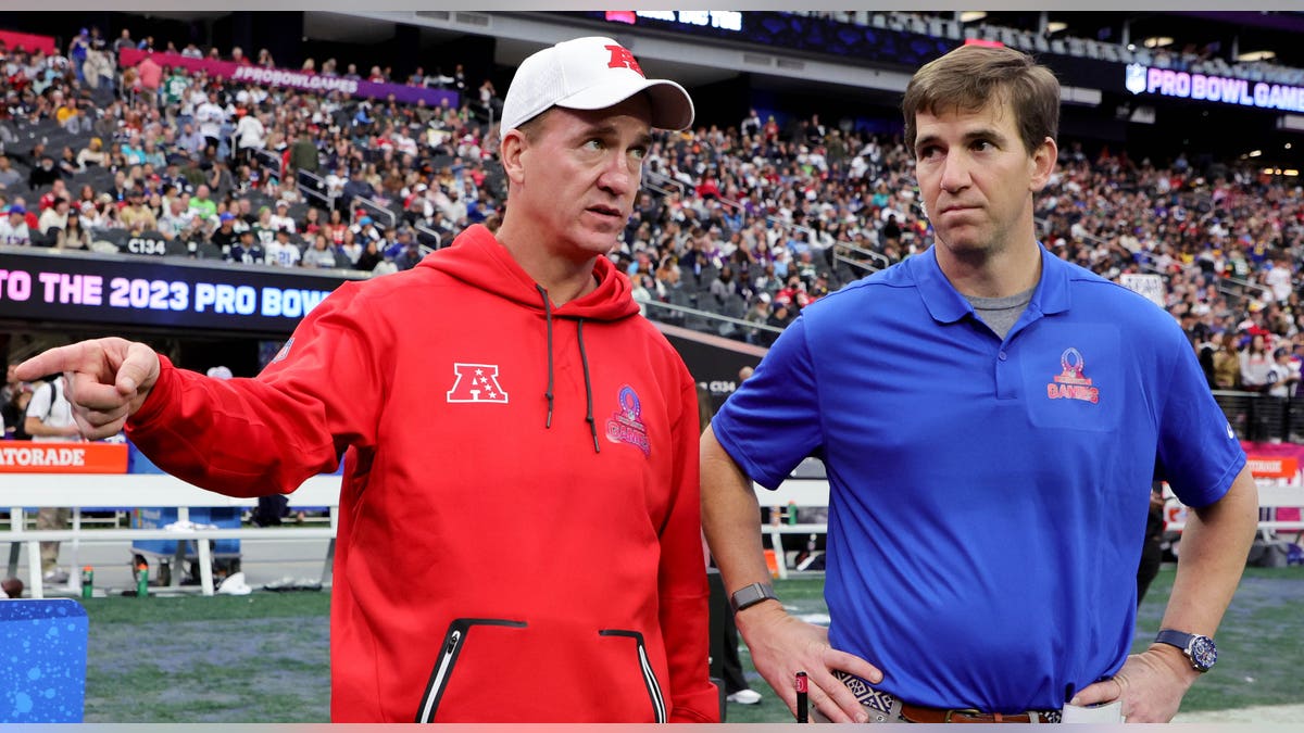 Peyton and Eli Manning coaching