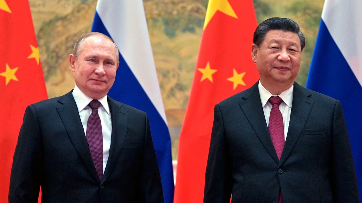 Vladimir Putin and Xi Jinping