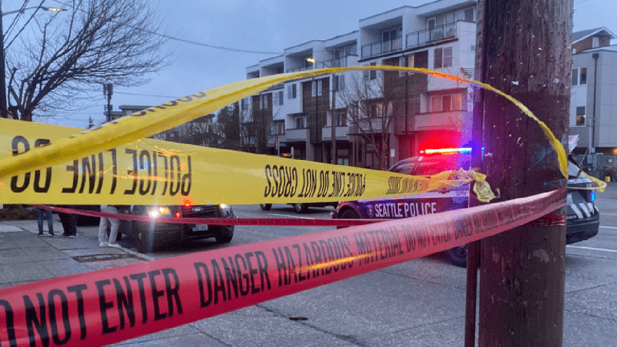 crime scene tape on Seattle sidewalk