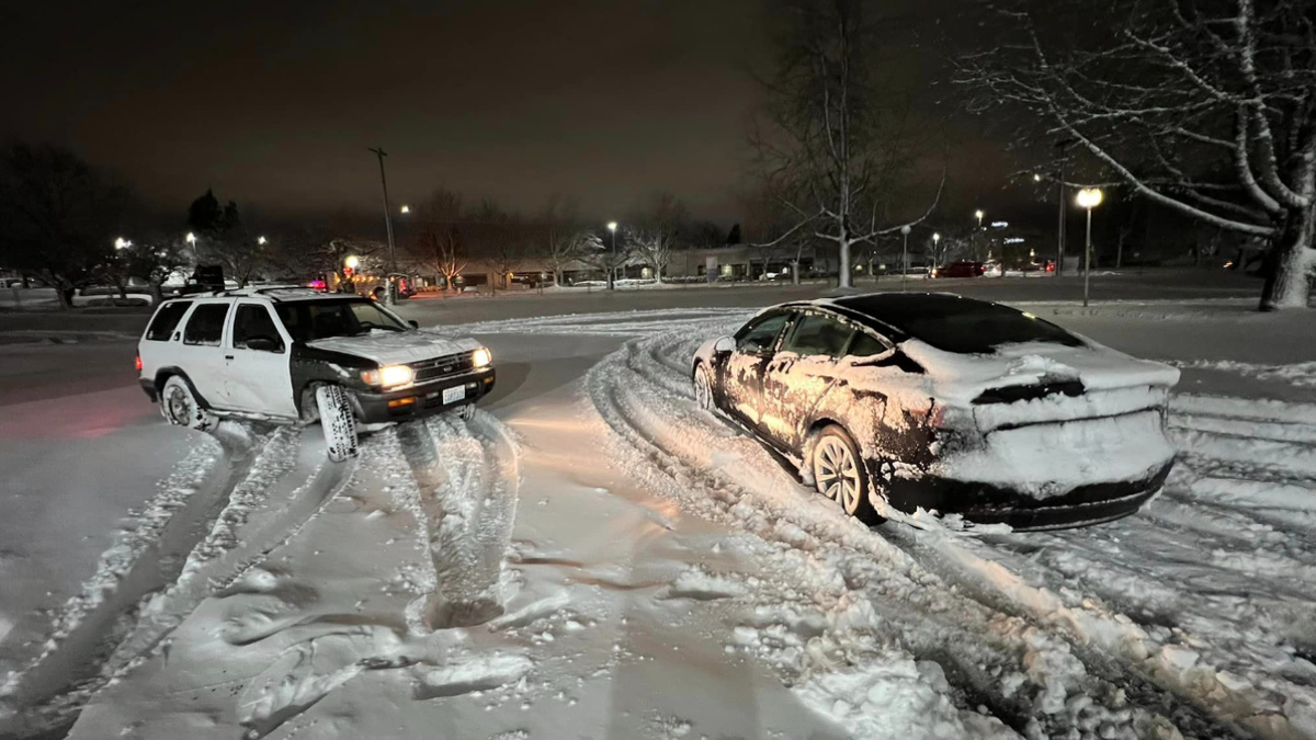 cars stuck on icy road
