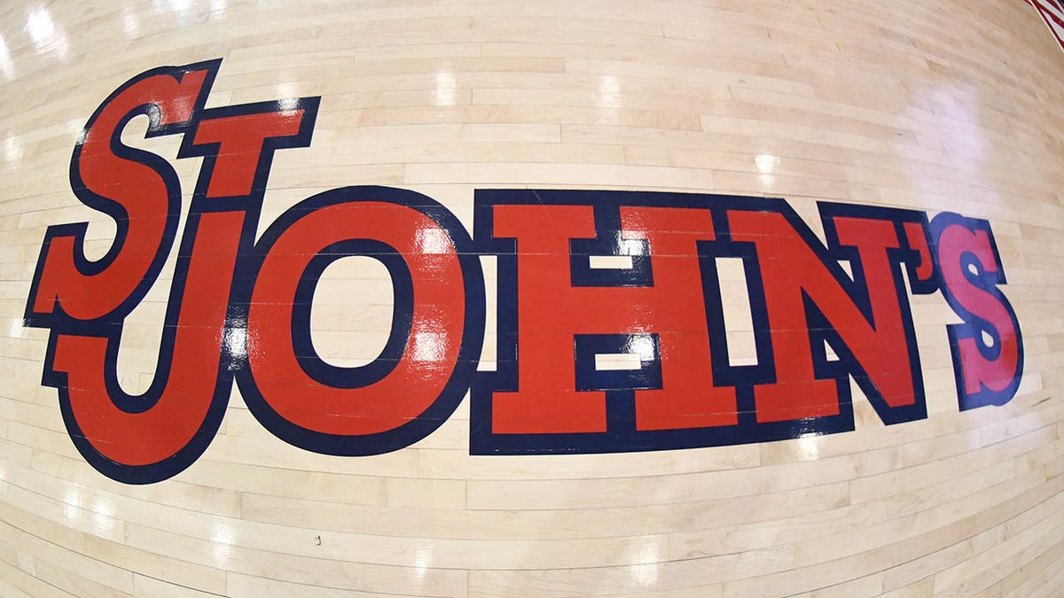 St Johns logo on court