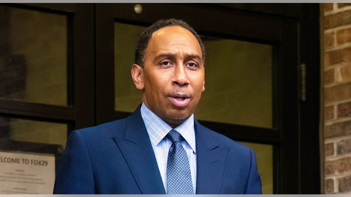 Stephen A. Smith walks