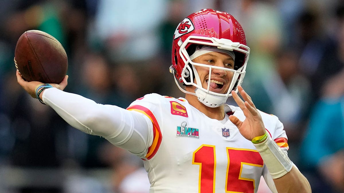 Patrick Mahomes throws football during Super Bowl practice