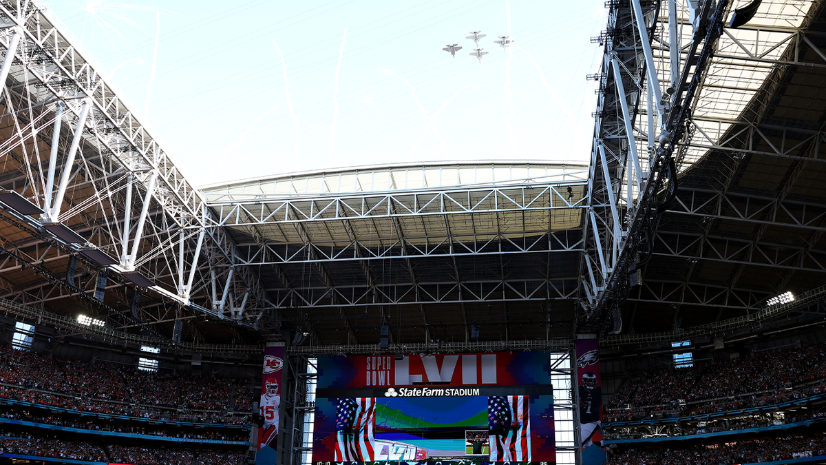 Jets fly over State Farm Stadium during the Super Bowl