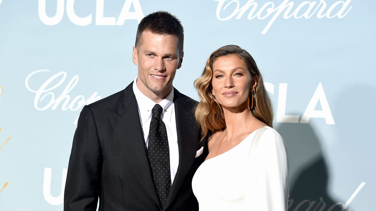 Tom Brady and Gisele Bundchen smiling