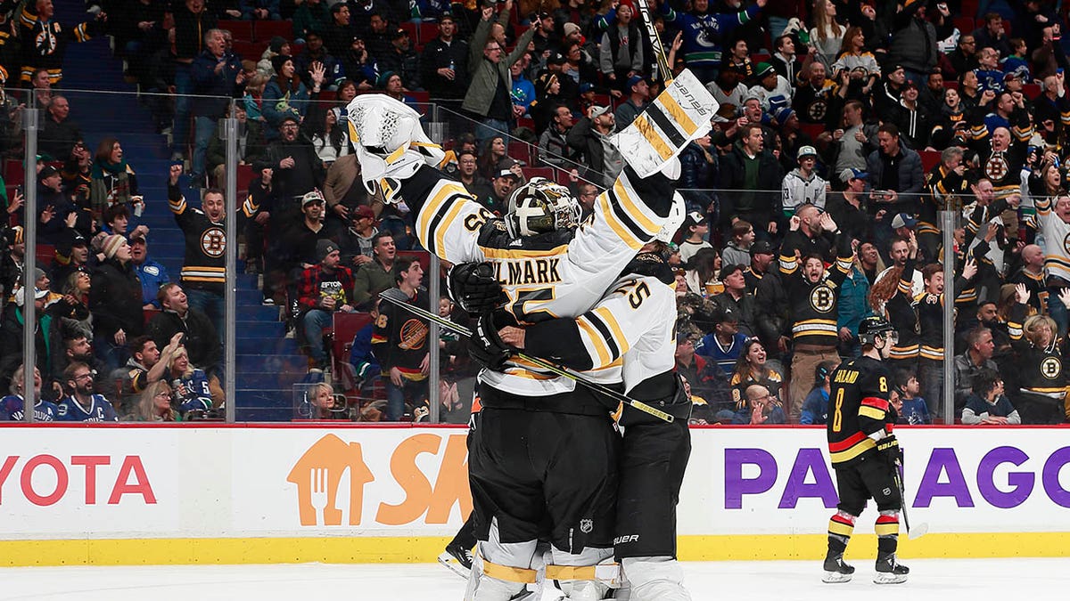 Bruins salute sales to service jersey