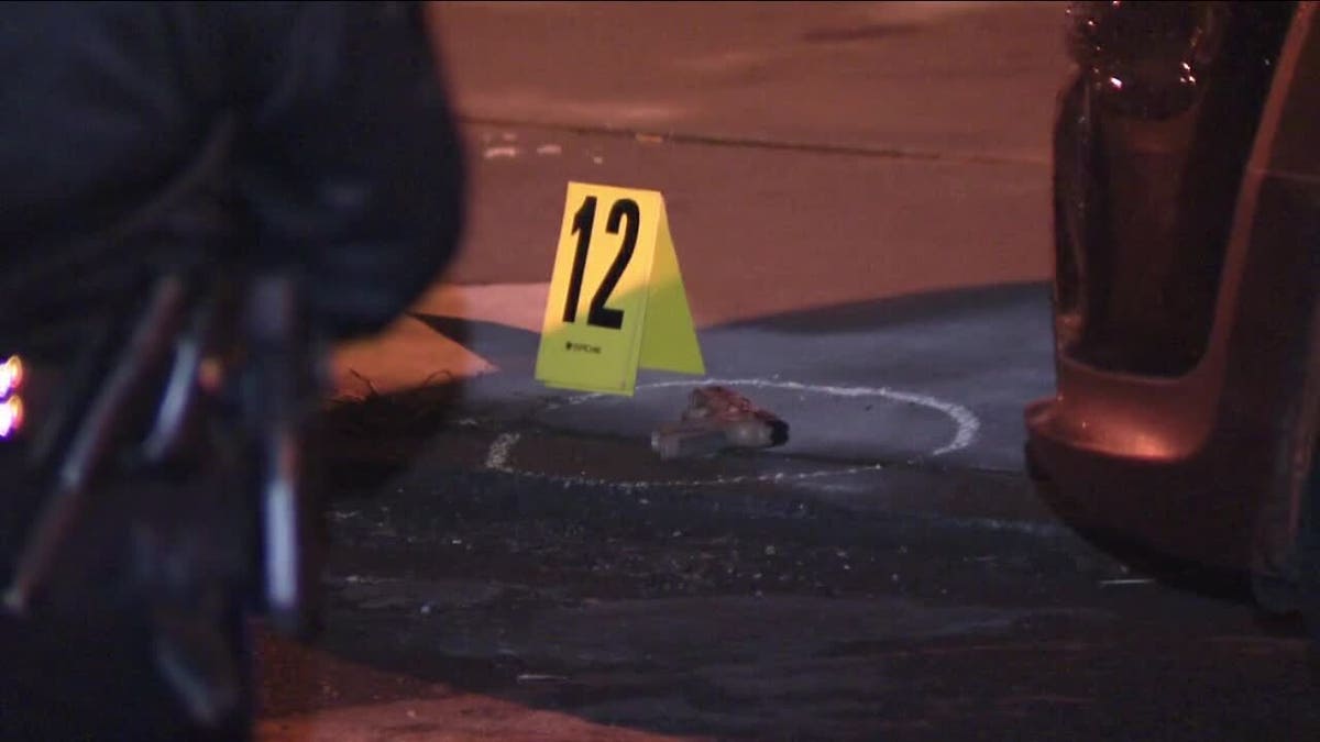 evidence marker and bullet shells on the ground