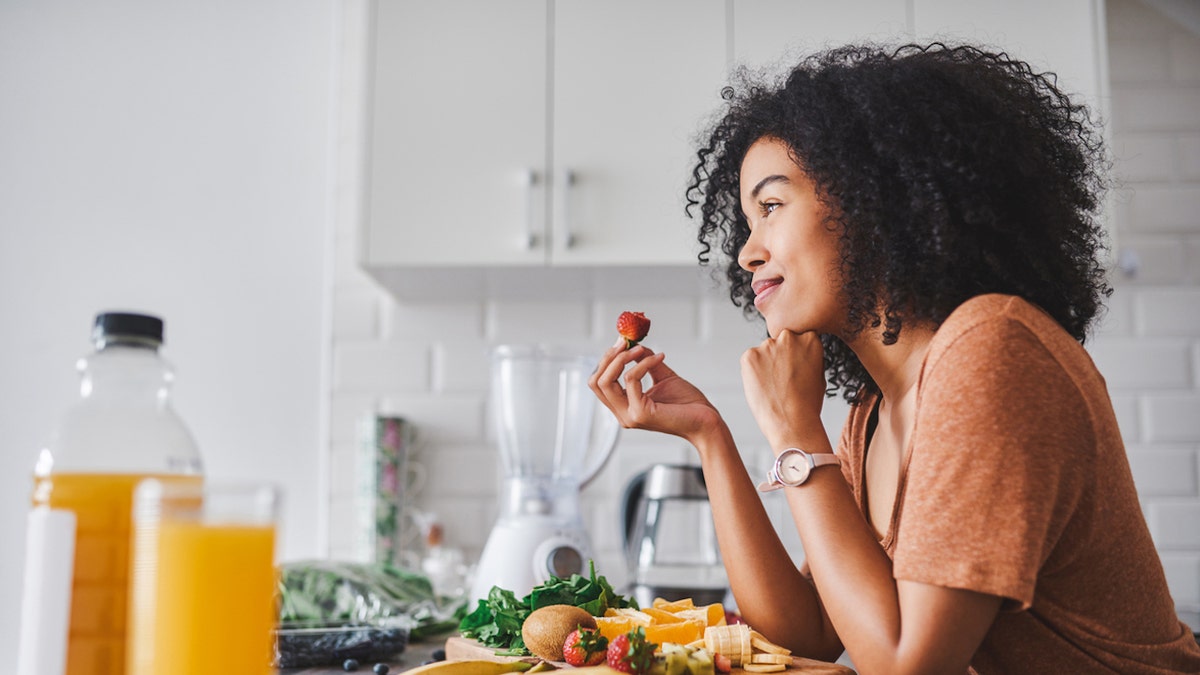 Woman eating healthy foods