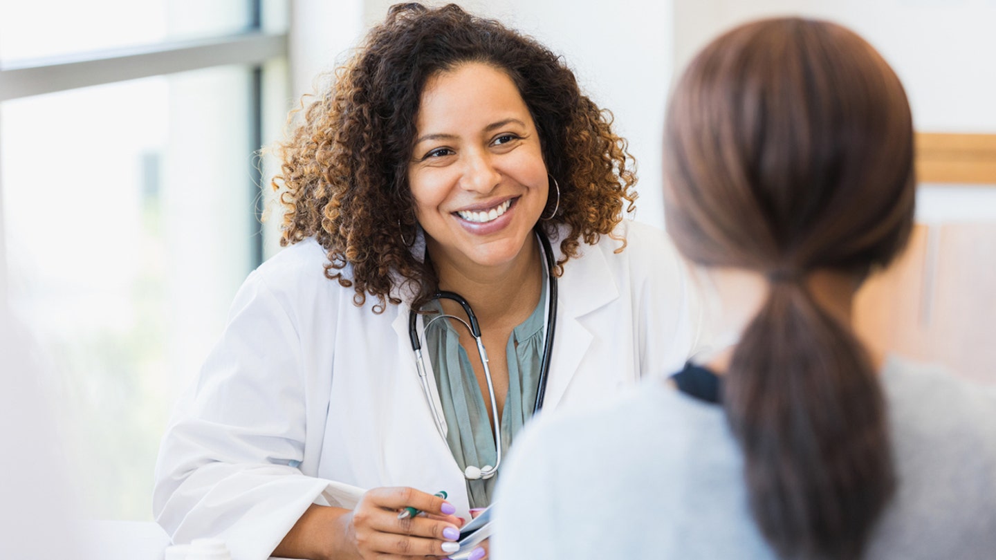 woman with doctor