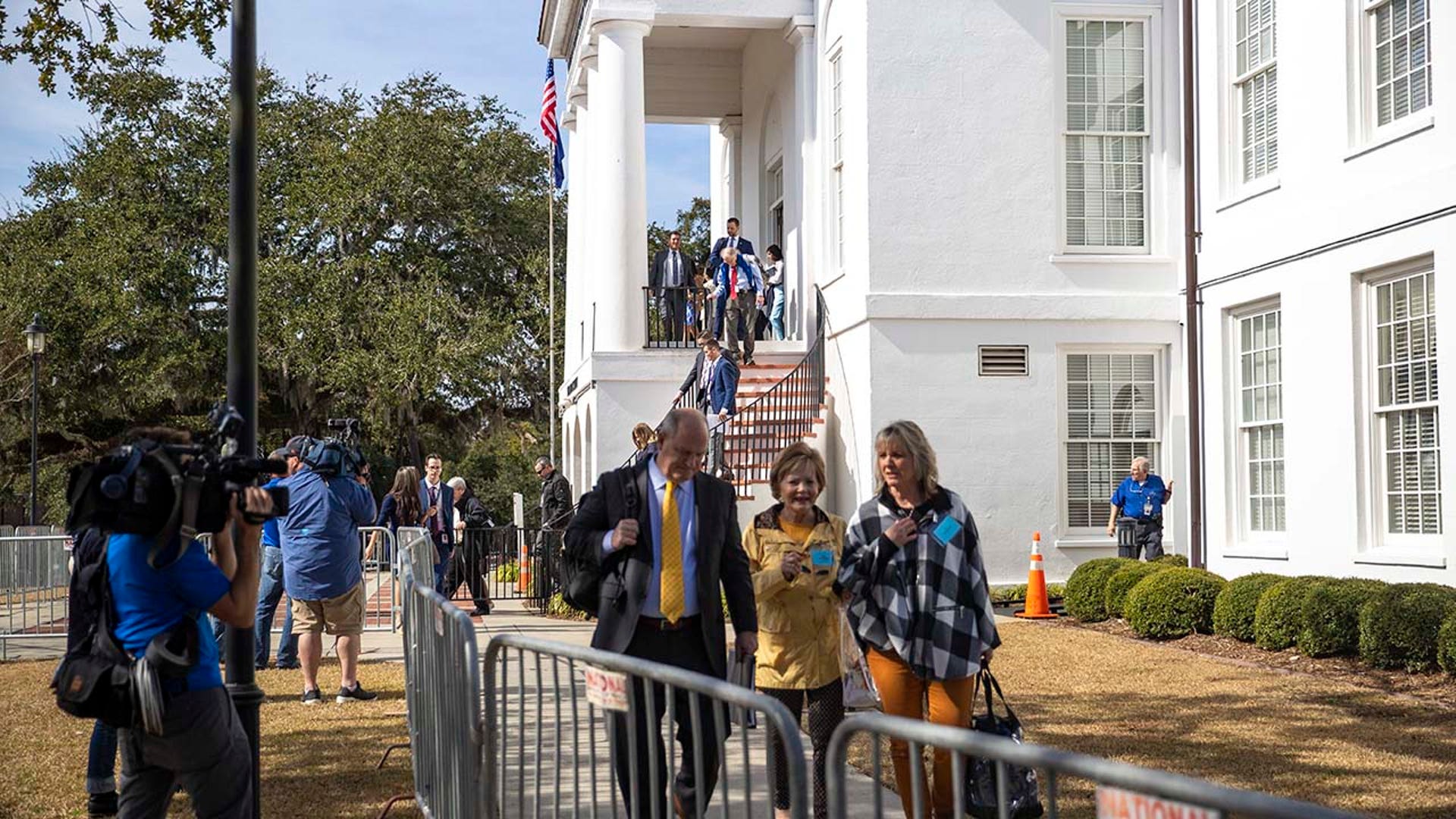People evacuate a courthouse.