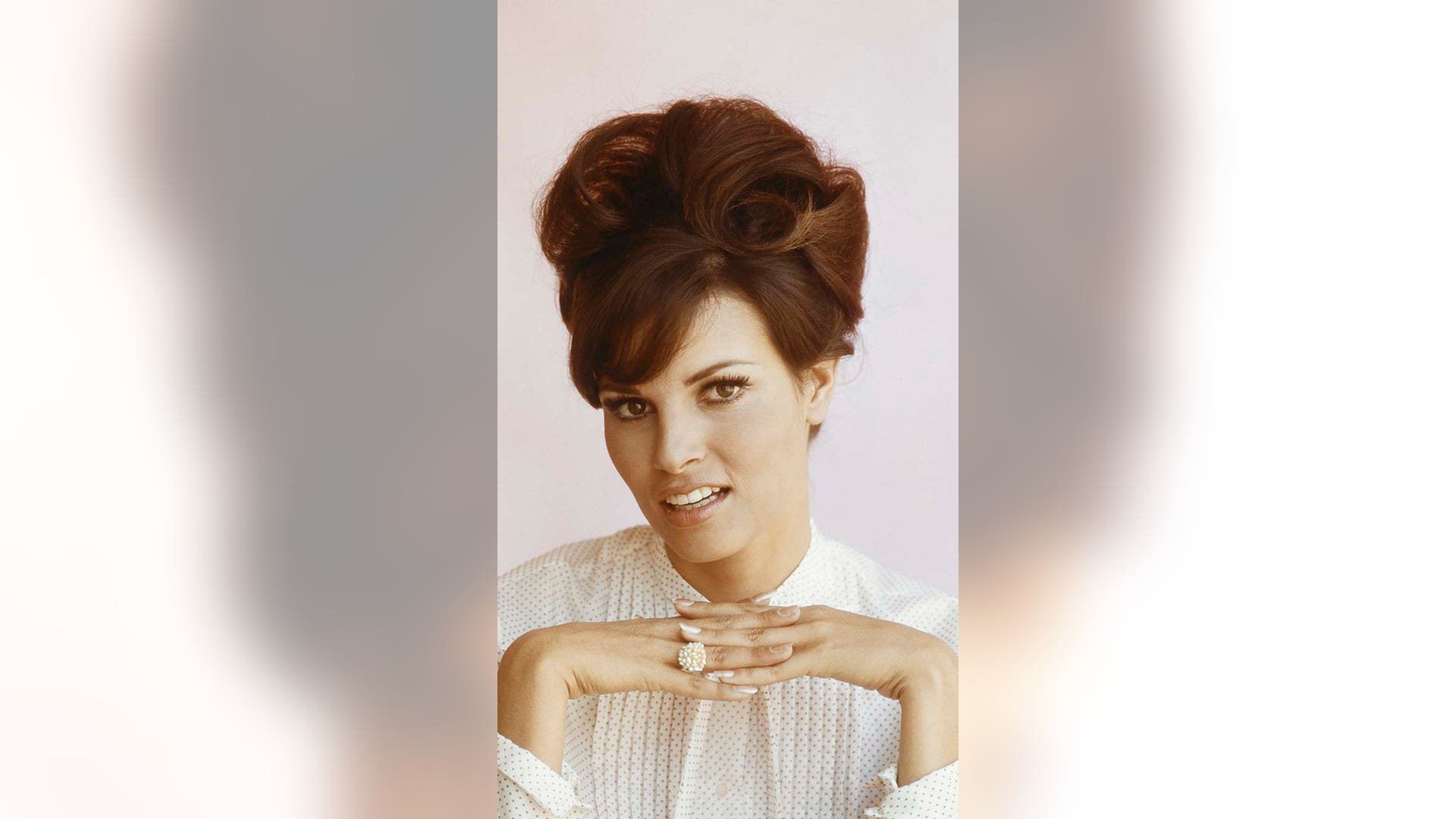 Raquel Welch with her hair up