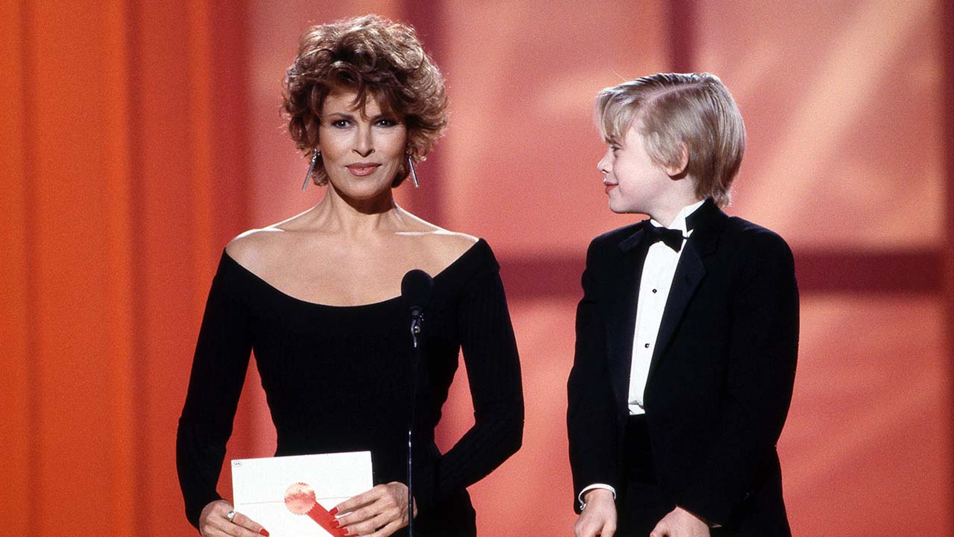 Raquel Welch and Macaulay Culkin presenting