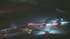 Los Angeles International Airport collision between plane and bus leaves at least 5 injured