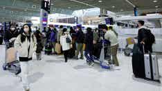 Japan eases coronavirus measures for tourists from China by only testing random passengers
