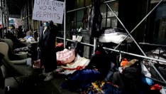 NYPD clears out group of migrant 'single men' refusing eviction from ritzy Manhattan hotel