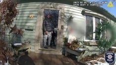 Illinois man wielding kitchen knives charges at police officers