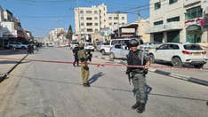 Israel calls up army battalions as serious violence hits West Bank following murder of Israeli brothers