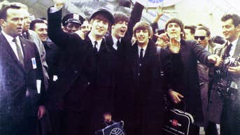 On February 7, 1964, Beatles arrive in US for first time, inspire nationwide mania