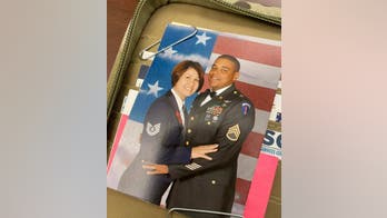 Armed civilian who shot at armed intruder on military base is spouse of highest-ranking Air Force NCO
