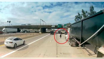 Harrowing video shows man darting through traffic across busy Arizona interstate