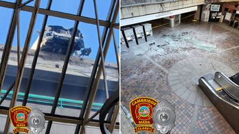 Photos show car dangling over the edge of Alewife MBTA parking garage after crash near Boston