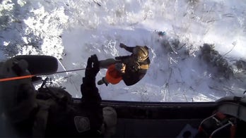 Dramatic rescue of Australian hiker stranded in freezing Arizona mountains caught on video