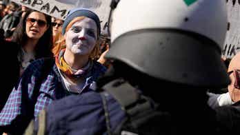 Artists protest outside Greece's parliament during strike that closed theaters, halted TV shoots