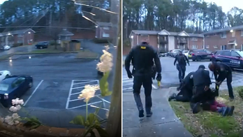 Video shows Atlanta, Georgia, burglary suspect jumping out of second-story window during police foot chase