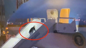 Biden stumbles, falls while boarding Air Force One