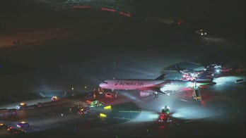 Los Angeles International Airport collision between plane and bus leaves at least 5 injured