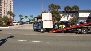 Woman dies after being run over by forklift at Florida motel, authorities say