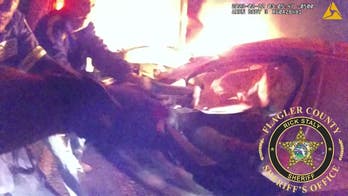 Florida driver rescued from fiery crash by Flagler sheriff's deputies, good Samaritans