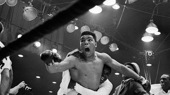 On this day in history, February 25, 1964, Muhammad Ali knocks out Sonny Liston to win first world title