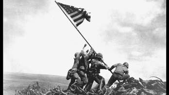 On this day in history, February 23, 1945, US Marines raise American flag on Iwo Jima, seen in stunning photo