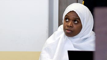 Haitian woman pleads guilty to weapons charges in NM compound raid