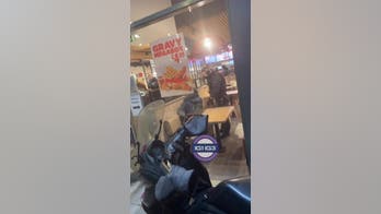 Armed UK police storm KFC restaurant after 'youth' seen with weapon