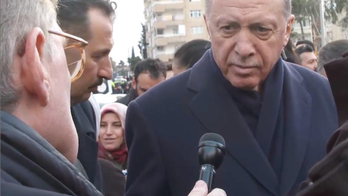 Turkey's Erdogan fights for political survival in tight race with presidential challenger