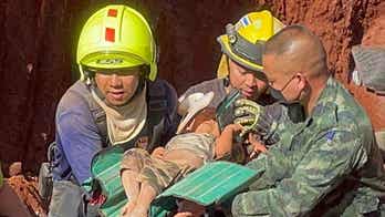 Thai rescue crew retrieves 18-month-old girl from 49-foot-deep well shaft