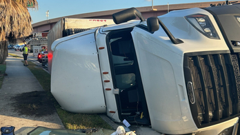 Florida authorities say truck carrying 1,000 milk crates overturns on highway