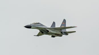 Chinese military orders US plane away from its airspace, flies fighter jet 500 feet from wing