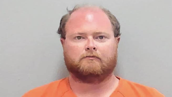 Florida high school janitor charged with 100 counts of child pornography possession