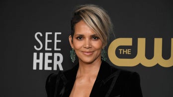 Halle Berry shares video and jokes after taking a big fall on stage at a charity event: 'I face planted'