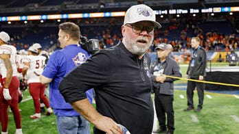 New Mexico State head coach Jerry Kill pays off costly bet from bowl game victory